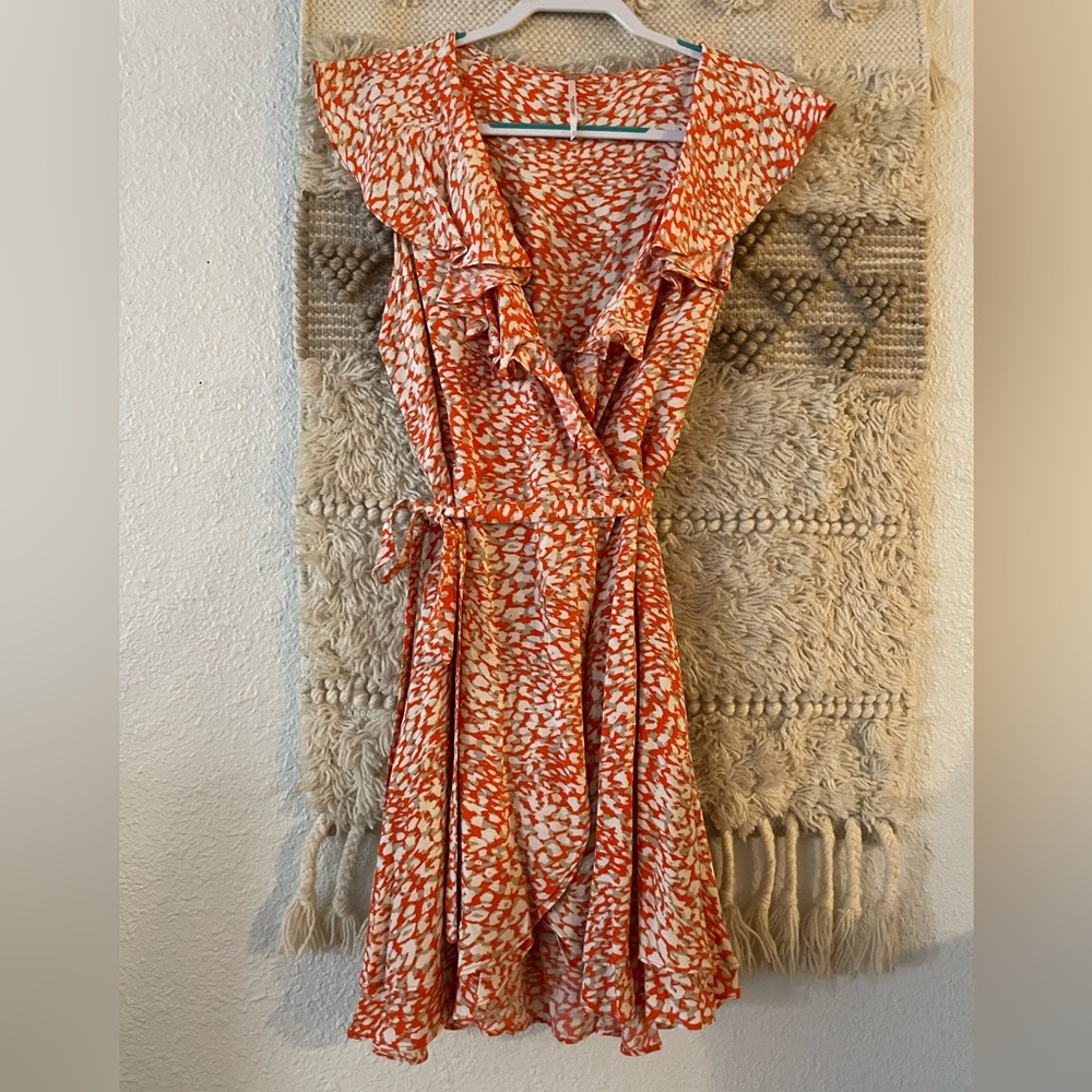 Free People French Quarter wrap dress size medium. Never worn.